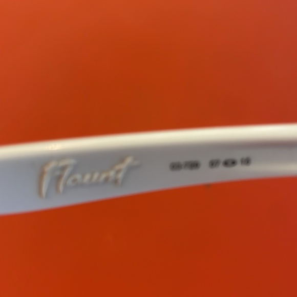 Oakley Flaunts white. New,  never worn with zippered case.